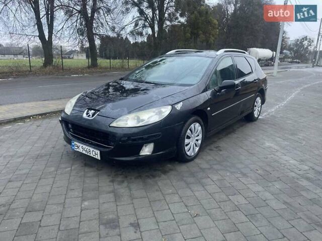 Черный Пежо 407, объемом двигателя 1.56 л и пробегом 270 тыс. км за 2499 $, фото 1 на Automoto.ua