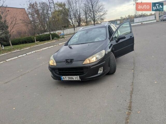 Черный Пежо 407, объемом двигателя 2.18 л и пробегом 306 тыс. км за 4800 $, фото 1 на Automoto.ua