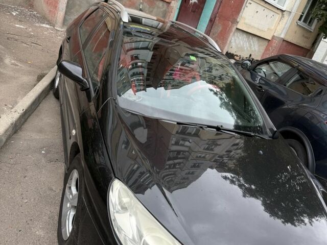 Черный Пежо 407, объемом двигателя 1.6 л и пробегом 303 тыс. км за 6000 $, фото 1 на Automoto.ua