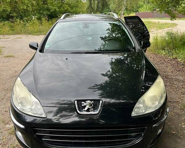 Черный Пежо 407, объемом двигателя 2 л и пробегом 242 тыс. км за 5500 $, фото 1 на Automoto.ua