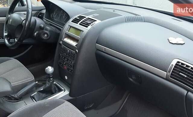 Серый Пежо 407, объемом двигателя 1.9 л и пробегом 320 тыс. км за 4200 $, фото 1 на Automoto.ua