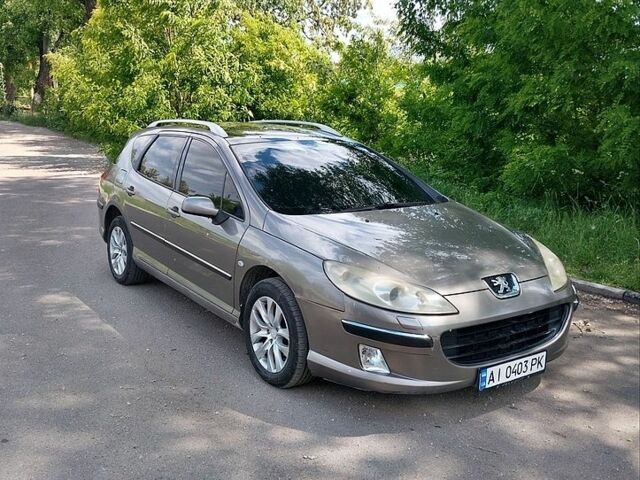 Серый Пежо 407, объемом двигателя 2 л и пробегом 410 тыс. км за 3700 $, фото 1 на Automoto.ua