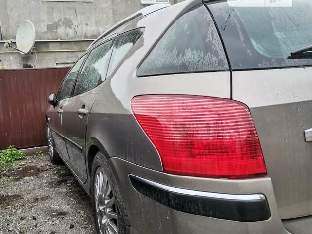 Серый Пежо 407, объемом двигателя 2 л и пробегом 430 тыс. км за 5000 $, фото 1 на Automoto.ua