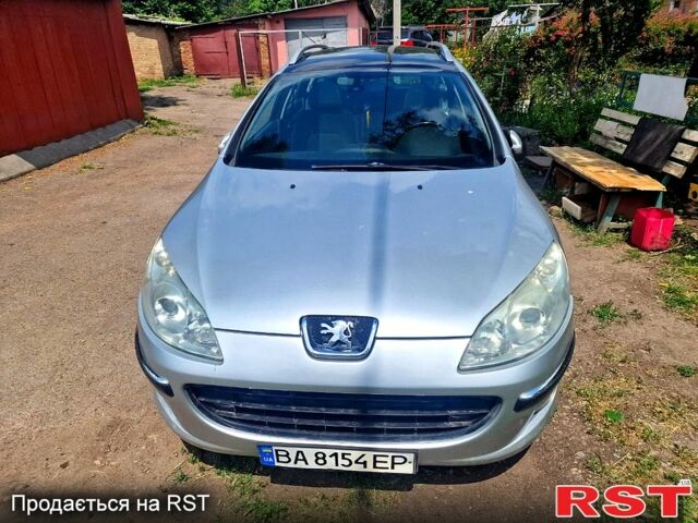 Серый Пежо 407, объемом двигателя 2 л и пробегом 367 тыс. км за 4400 $, фото 1 на Automoto.ua