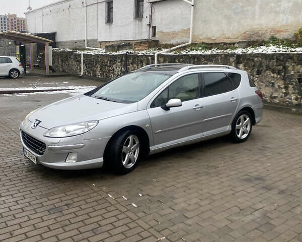 Серый Пежо 407, объемом двигателя 2 л и пробегом 301 тыс. км за 4700 $, фото 1 на Automoto.ua