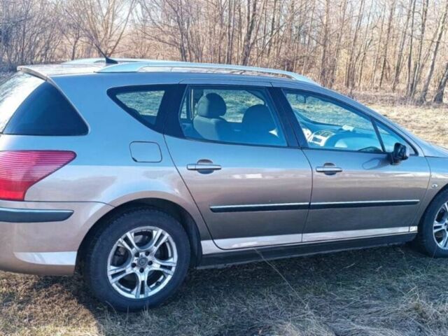 Серый Пежо 407, объемом двигателя 2 л и пробегом 322 тыс. км за 5800 $, фото 1 на Automoto.ua