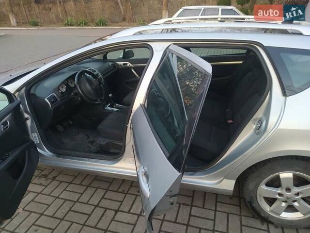 Серый Пежо 407, объемом двигателя 1.6 л и пробегом 230 тыс. км за 4400 $, фото 1 на Automoto.ua