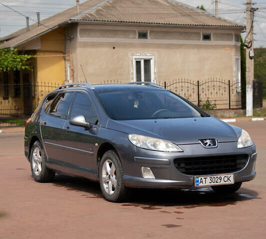 Серый Пежо 407, объемом двигателя 2 л и пробегом 250 тыс. км за 4500 $, фото 1 на Automoto.ua