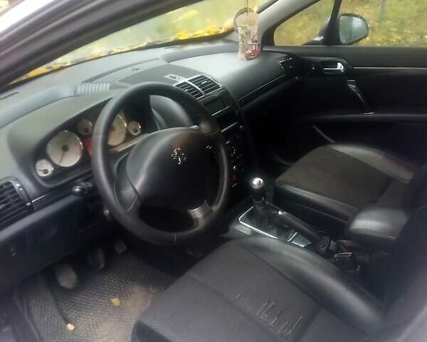 Серый Пежо 407, объемом двигателя 1.56 л и пробегом 295 тыс. км за 4550 $, фото 1 на Automoto.ua