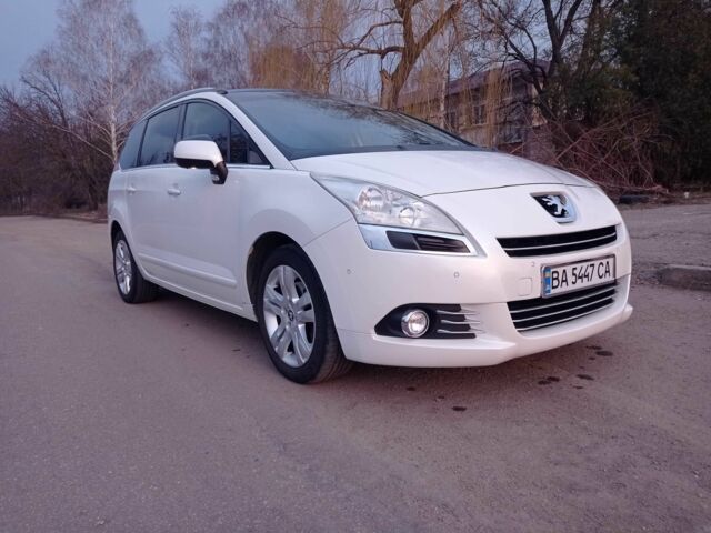 Белый Пежо 5008, объемом двигателя 2 л и пробегом 228 тыс. км за 7000 $, фото 1 на Automoto.ua