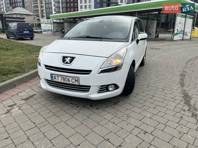 Белый Пежо 5008, объемом двигателя 1.56 л и пробегом 306 тыс. км за 8850 $, фото 1 на Automoto.ua