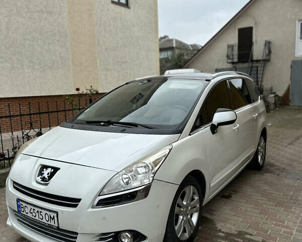 Белый Пежо 5008, объемом двигателя 1.6 л и пробегом 198 тыс. км за 8799 $, фото 1 на Automoto.ua