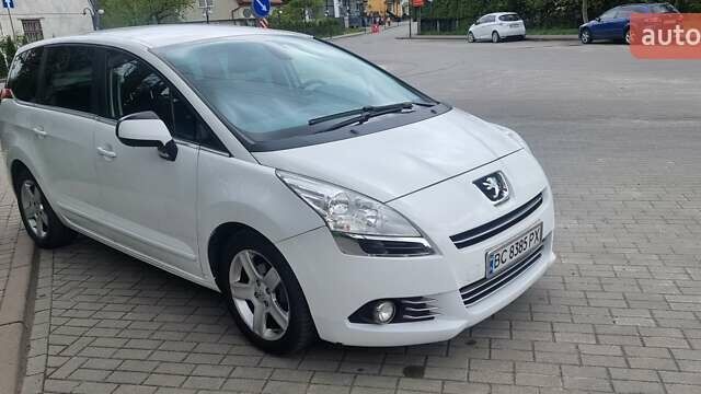 Белый Пежо 5008, объемом двигателя 1.6 л и пробегом 256 тыс. км за 8000 $, фото 1 на Automoto.ua
