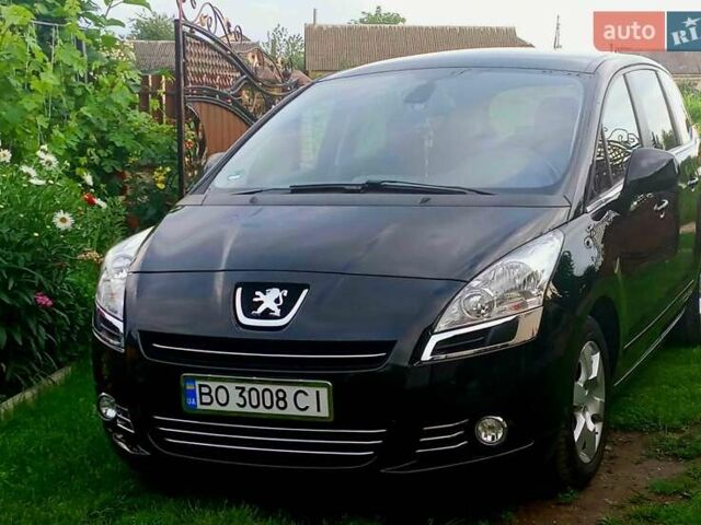 Черный Пежо 5008, объемом двигателя 1.6 л и пробегом 205 тыс. км за 7000 $, фото 1 на Automoto.ua