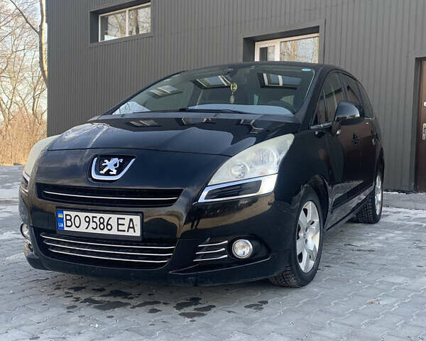 Черный Пежо 5008, объемом двигателя 1.56 л и пробегом 255 тыс. км за 8200 $, фото 1 на Automoto.ua