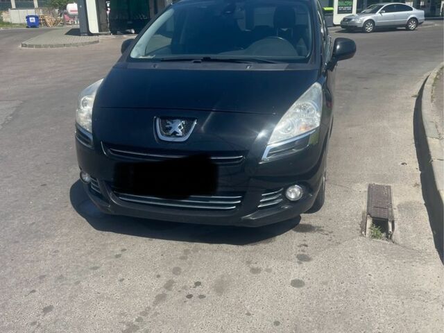 Черный Пежо 5008, объемом двигателя 1.6 л и пробегом 295 тыс. км за 7450 $, фото 1 на Automoto.ua