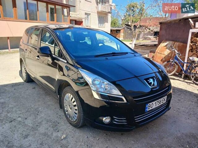 Черный Пежо 5008, объемом двигателя 2 л и пробегом 240 тыс. км за 8500 $, фото 1 на Automoto.ua