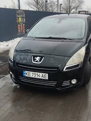 Черный Пежо 5008, объемом двигателя 1.6 л и пробегом 289 тыс. км за 6200 $, фото 1 на Automoto.ua