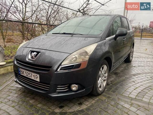 Серый Пежо 5008, объемом двигателя 1.56 л и пробегом 210 тыс. км за 8900 $, фото 1 на Automoto.ua