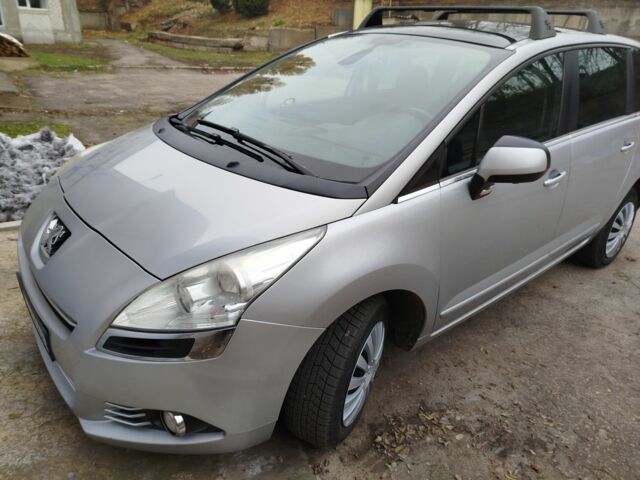 Серый Пежо 5008, объемом двигателя 1.6 л и пробегом 278 тыс. км за 7200 $, фото 1 на Automoto.ua