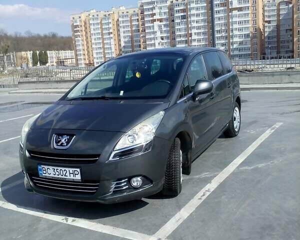 Серый Пежо 5008, объемом двигателя 1.6 л и пробегом 244 тыс. км за 6500 $, фото 1 на Automoto.ua