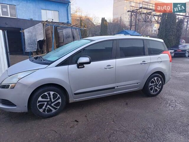 Серый Пежо 5008, объемом двигателя 1.6 л и пробегом 205 тыс. км за 5500 $, фото 1 на Automoto.ua