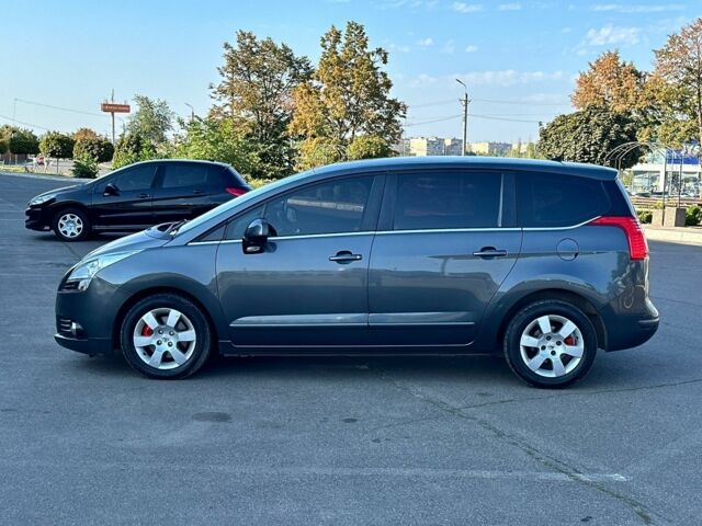 Серый Пежо 5008, объемом двигателя 1.6 л и пробегом 215 тыс. км за 7000 $, фото 1 на Automoto.ua