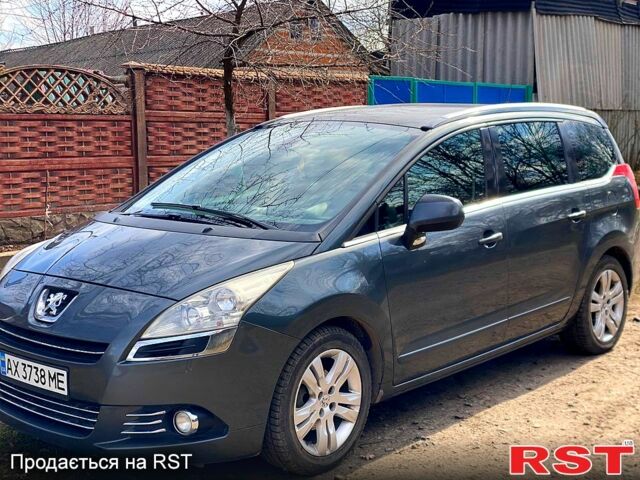 Серый Пежо 5008, объемом двигателя 1.6 л и пробегом 290 тыс. км за 8300 $, фото 1 на Automoto.ua