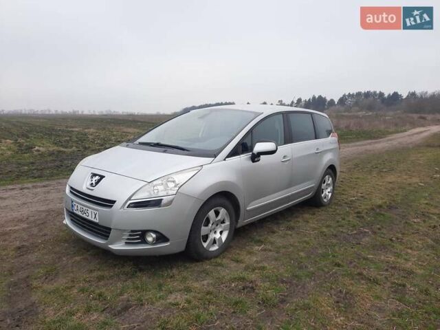 Серый Пежо 5008, объемом двигателя 1.6 л и пробегом 239 тыс. км за 8700 $, фото 1 на Automoto.ua