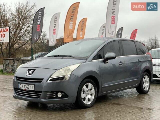Серый Пежо 5008, объемом двигателя 1.6 л и пробегом 276 тыс. км за 7999 $, фото 1 на Automoto.ua