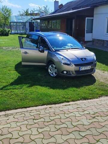 Серый Пежо 5008, объемом двигателя 1.6 л и пробегом 180 тыс. км за 8100 $, фото 1 на Automoto.ua