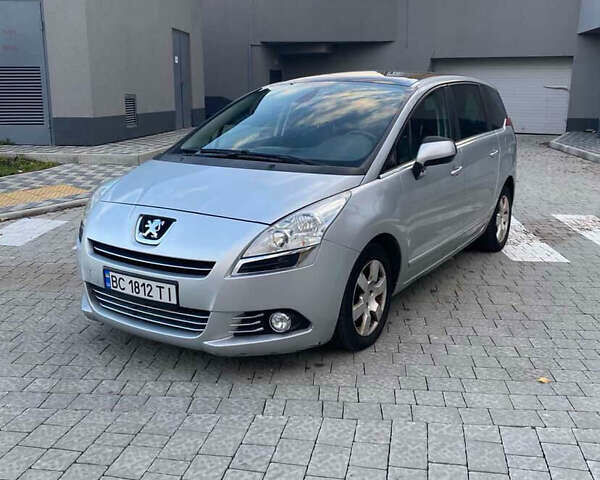 Серый Пежо 5008, объемом двигателя 1.6 л и пробегом 230 тыс. км за 9500 $, фото 1 на Automoto.ua