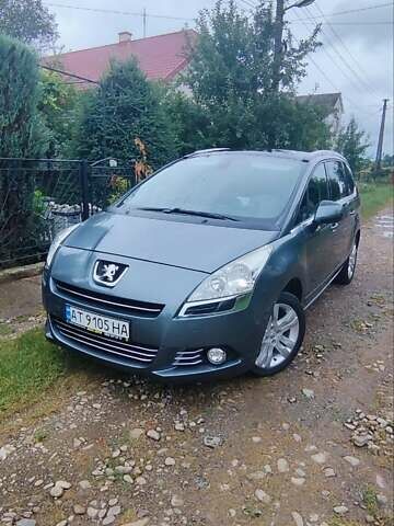 Сірий Пежо 5008, об'ємом двигуна 1.6 л та пробігом 245 тис. км за 7600 $, фото 1 на Automoto.ua