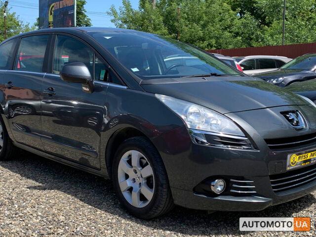 Серый Пежо 5008, объемом двигателя 1.6 л и пробегом 278 тыс. км за 8900 $, фото 1 на Automoto.ua