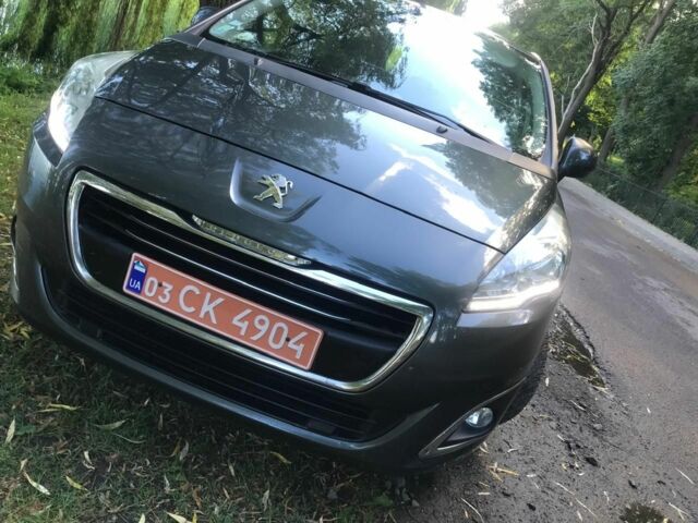 Серый Пежо 5008, объемом двигателя 1.6 л и пробегом 217 тыс. км за 10100 $, фото 1 на Automoto.ua