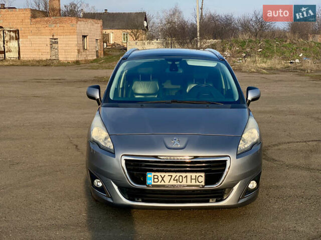 Серый Пежо 5008, объемом двигателя 2 л и пробегом 315 тыс. км за 10299 $, фото 1 на Automoto.ua