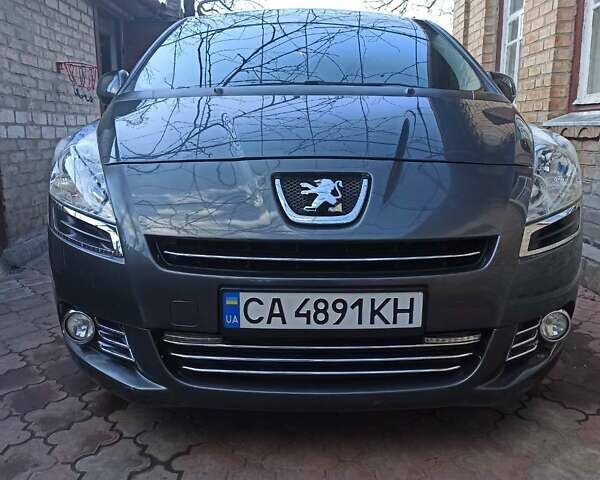 Серый Пежо 5008, объемом двигателя 1.6 л и пробегом 212 тыс. км за 7100 $, фото 1 на Automoto.ua