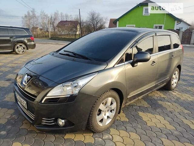 Серый Пежо 5008, объемом двигателя 2 л и пробегом 250 тыс. км за 8500 $, фото 1 на Automoto.ua