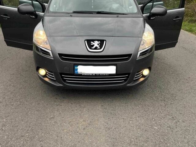 Серый Пежо 5008, объемом двигателя 1.6 л и пробегом 235 тыс. км за 7800 $, фото 1 на Automoto.ua