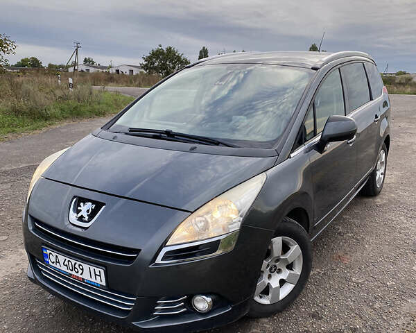 Серый Пежо 5008, объемом двигателя 1.6 л и пробегом 226 тыс. км за 8000 $, фото 1 на Automoto.ua