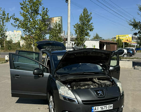 Серый Пежо 5008, объемом двигателя 1.6 л и пробегом 298 тыс. км за 7500 $, фото 1 на Automoto.ua