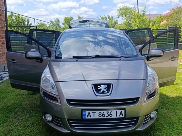 Серый Пежо 5008, объемом двигателя 2 л и пробегом 220 тыс. км за 9300 $, фото 1 на Automoto.ua