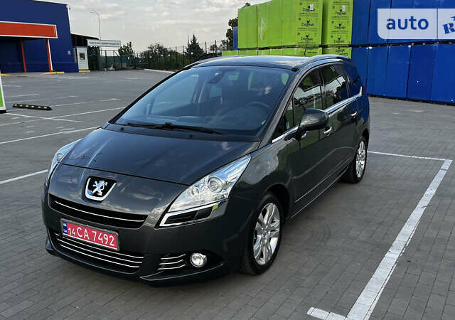 Серый Пежо 5008, объемом двигателя 1.6 л и пробегом 187 тыс. км за 9800 $, фото 1 на Automoto.ua