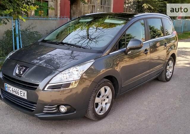 Сірий Пежо 5008, об'ємом двигуна 1.6 л та пробігом 182 тис. км за 11800 $, фото 1 на Automoto.ua