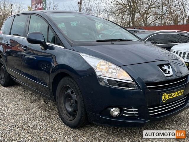 Синий Пежо 5008, объемом двигателя 1.6 л и пробегом 206 тыс. км за 9400 $, фото 1 на Automoto.ua