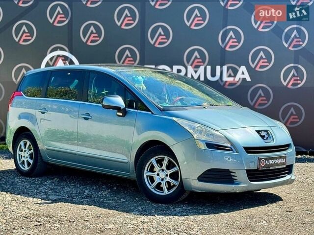 Синий Пежо 5008, объемом двигателя 1.6 л и пробегом 195 тыс. км за 5990 $, фото 1 на Automoto.ua