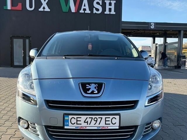 Синий Пежо 5008, объемом двигателя 1.6 л и пробегом 243 тыс. км за 7900 $, фото 1 на Automoto.ua