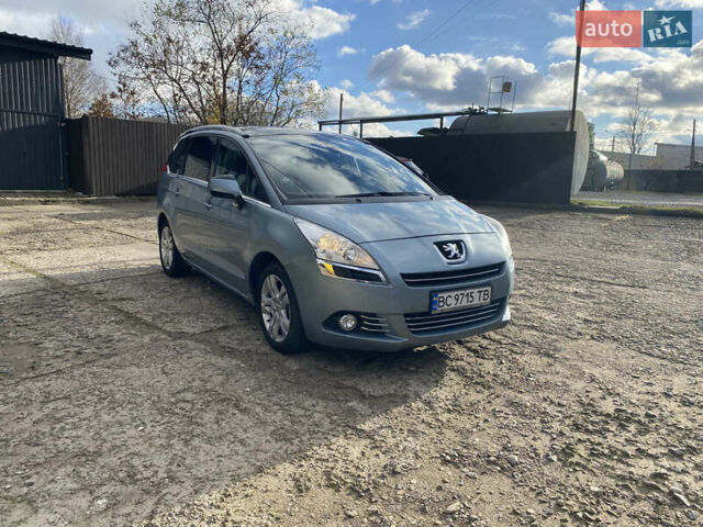 Синий Пежо 5008, объемом двигателя 1.6 л и пробегом 228 тыс. км за 7400 $, фото 1 на Automoto.ua