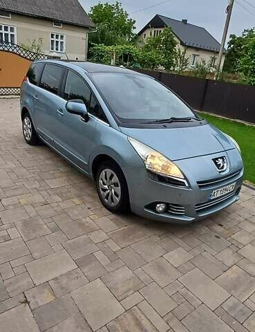 Синий Пежо 5008, объемом двигателя 1.6 л и пробегом 286 тыс. км за 7200 $, фото 1 на Automoto.ua