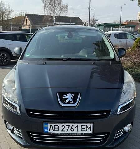 Синий Пежо 5008, объемом двигателя 1.56 л и пробегом 203 тыс. км за 9400 $, фото 1 на Automoto.ua